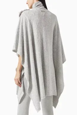 CABLE KNIT PONCHO WITH FUR NECKLINE AND POCKETS IN FOG